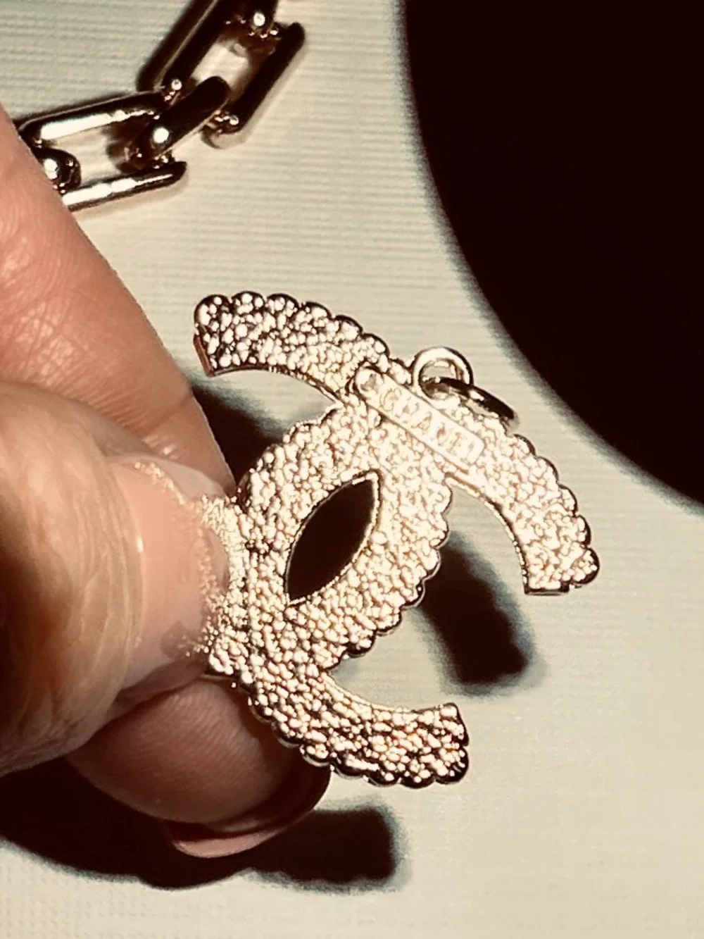 CHANEL Gold CC Pendant with Pink Ribbon New Elegant Chain